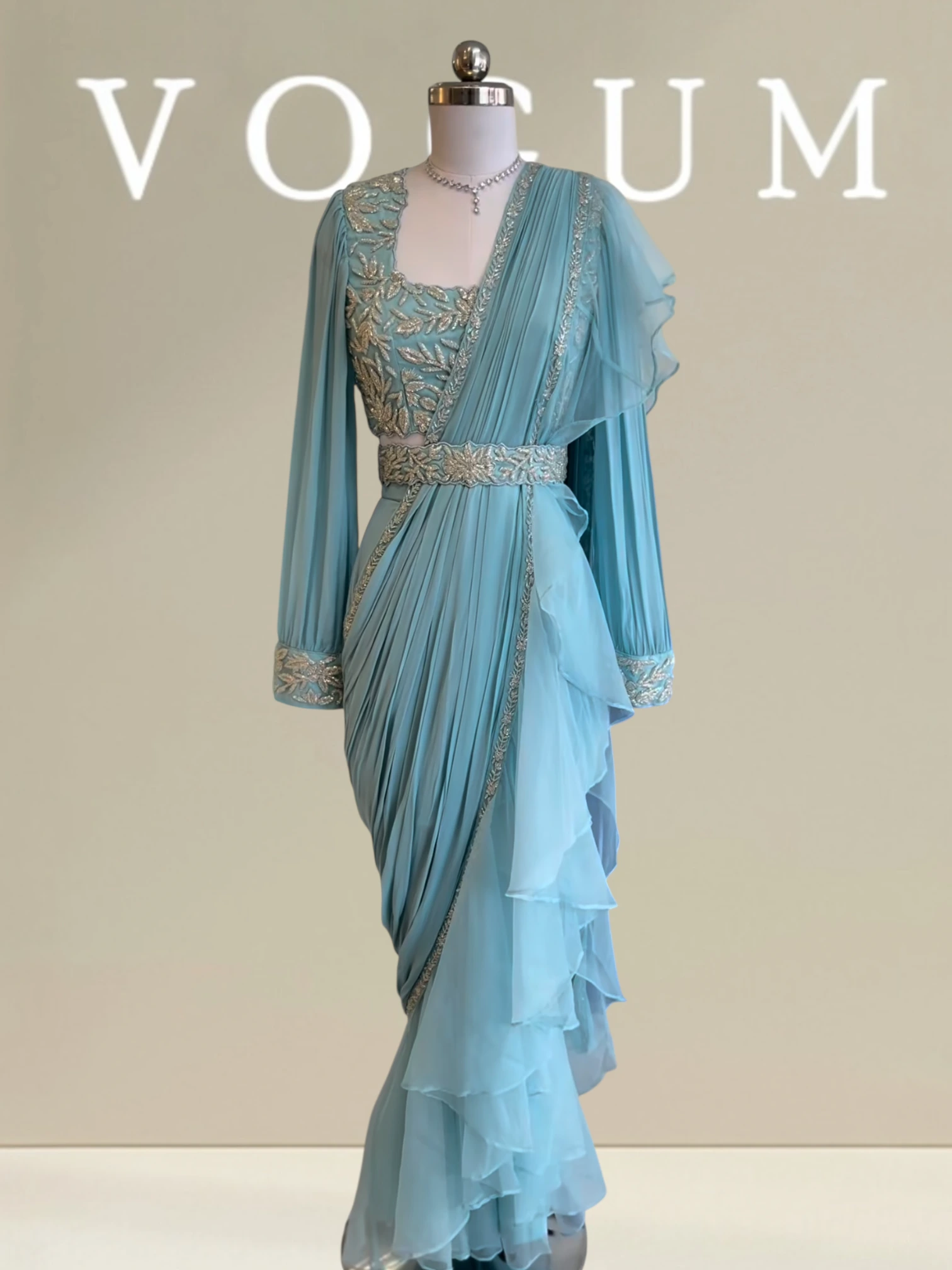 Vogum’s grace full sleeved ruffle saree related product