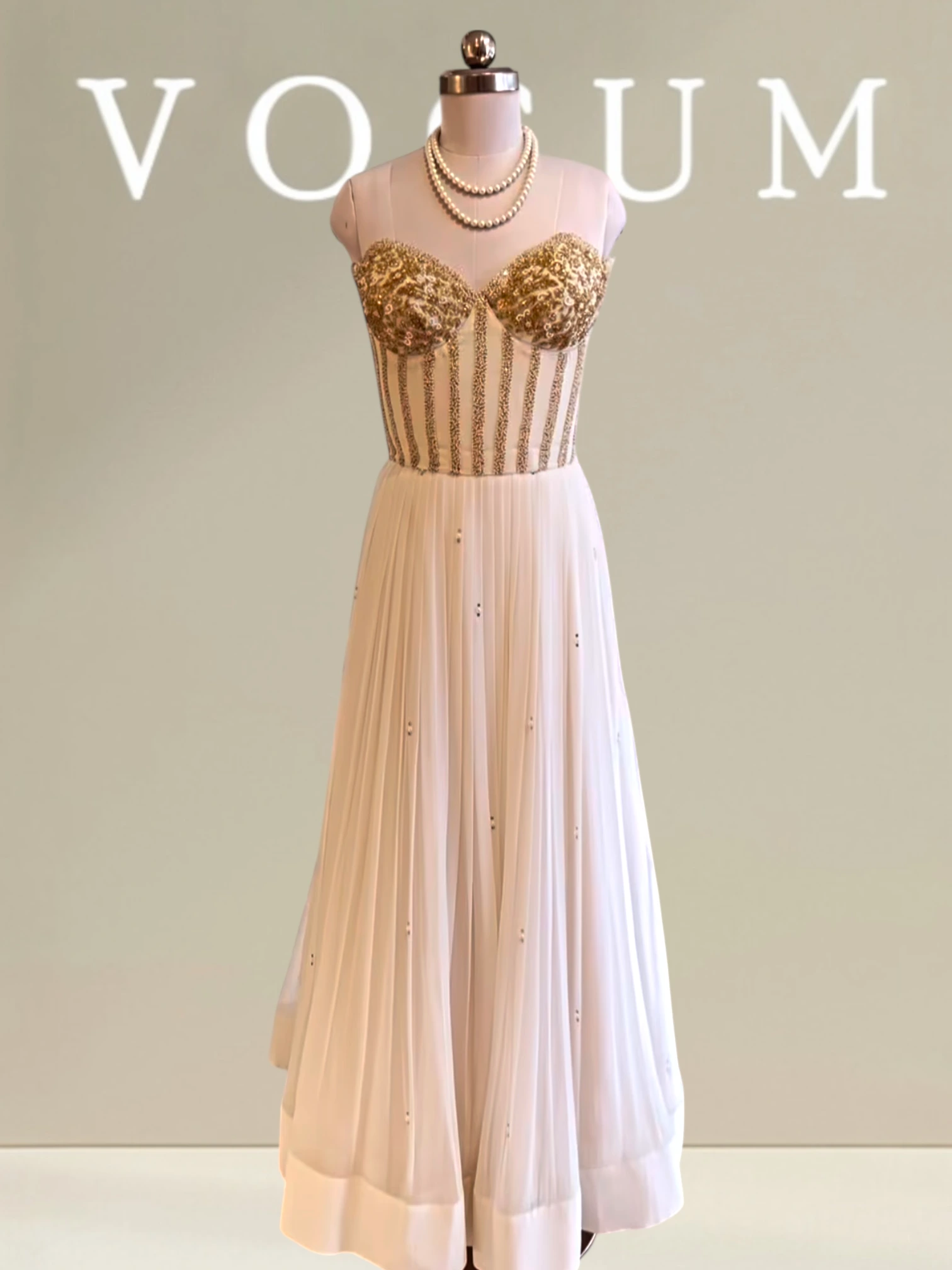 Pleated skirt with stylish corset blouse product image