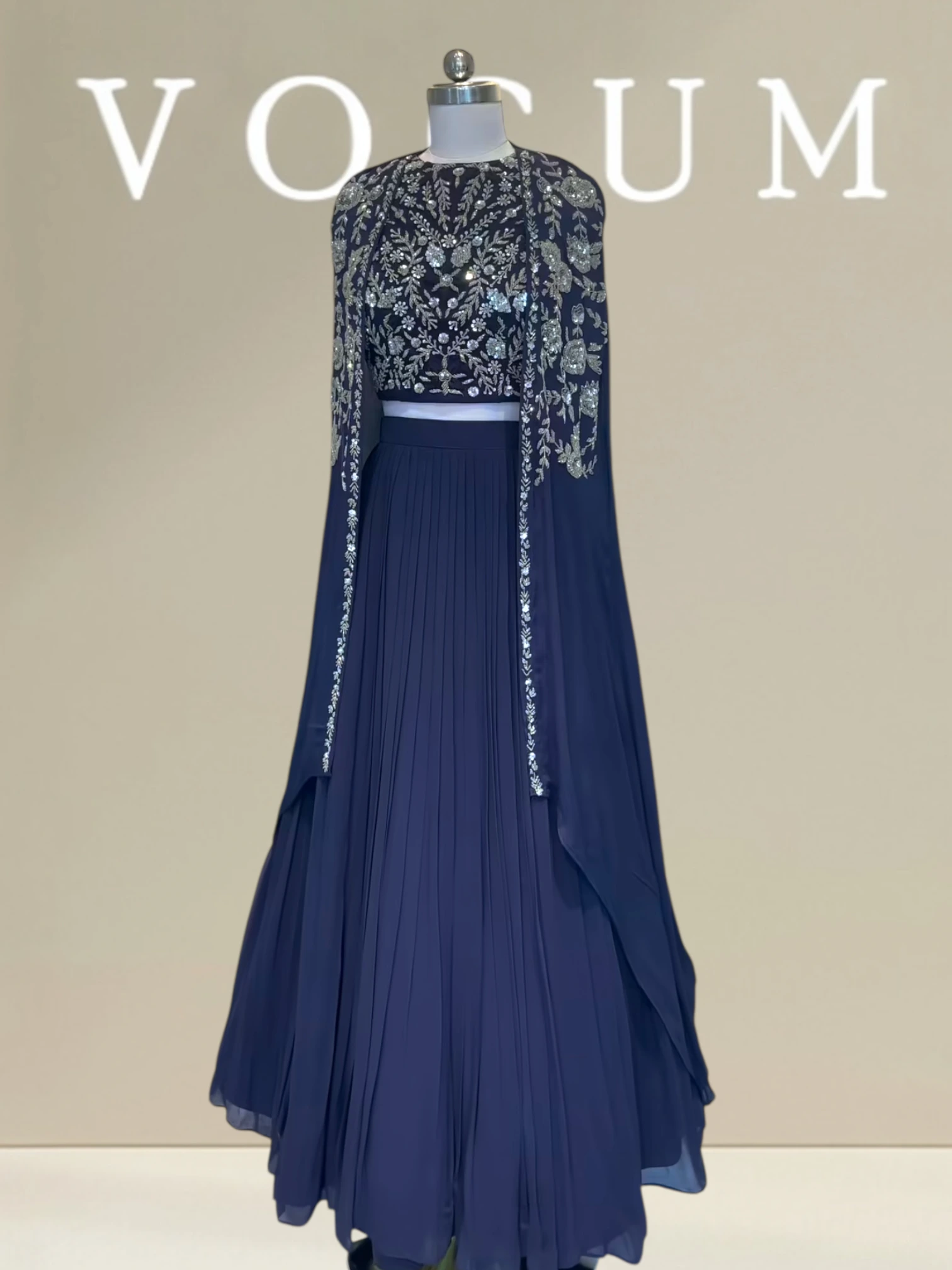 Pleated skirt with flowy cape product image