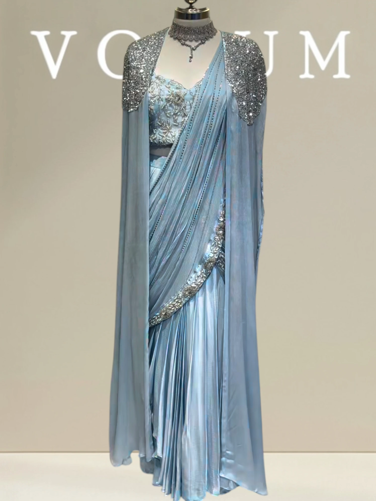 Stylish drape with flowy cape product image